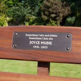 Bronze plaque with decorative border